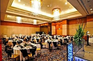 The Eastwood Richmonde Hotel ballrooms have high ceiling and chandeliers to make any event beautifully memorable