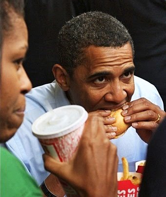 picture of fat kid eating cake. Michelle Obama eating cake