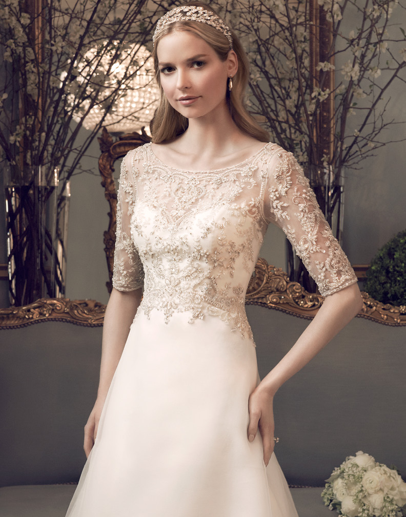 http://www.aislestyle.co.uk/sparkling-beaded-bodice-half-sleeved-slim-aline-wedding-dress-p-1688.html