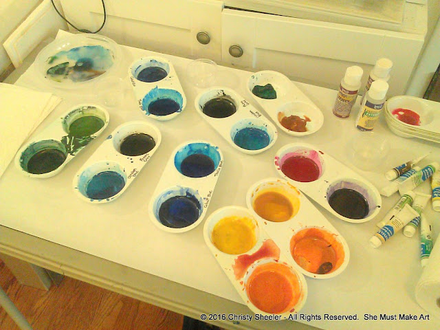 Watercolors in plastic palettes ready to go!  Setting up my materials.