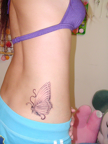 lower back butterfly tattoos. cute utterfly tattoos. cute