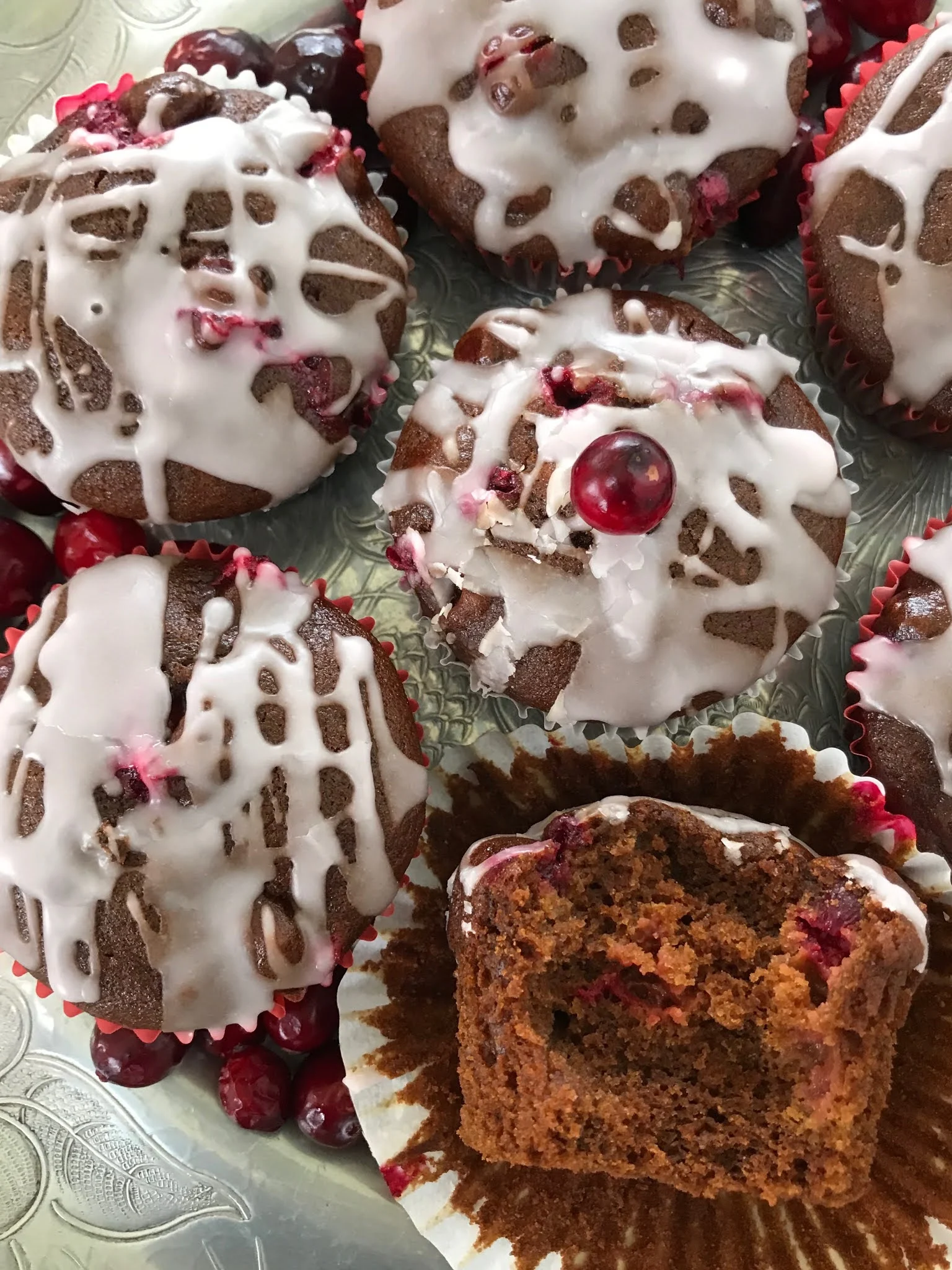 Glazed cranberry gingerbread muffins