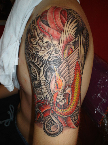 Dragon Tattoo Arm Art tribal dragon tattoo with Japanese design