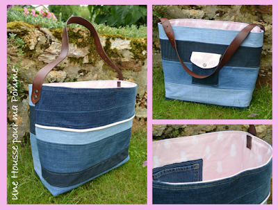 Sac à main rigide entièrement fait de matériaux recyclés, jeans de récup montés façon patchwork, ceinture cuir recyclé en anse et sertie par mes soins à l'aide de rivets, poche extérieur avec bouton pression, tissu intérieur coton ananas rose pale, poche intérieur en jeans.  Dimensions : 37 x 31 x 14 cm environ.