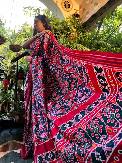 Red pochampally saree with koi fish motifs