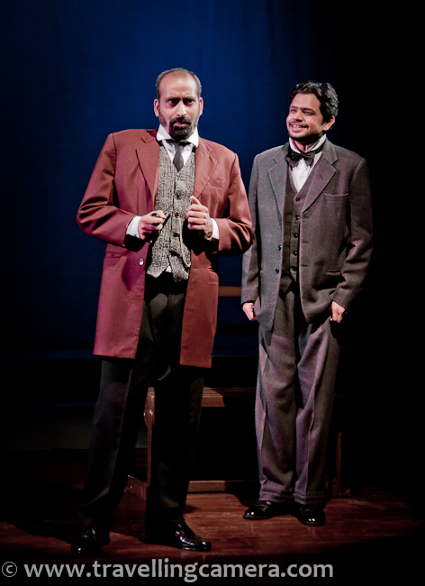 I hope you have already checked pre-interval stories from 'Chekhov ki Duniya', if not check out following link to know about this play and first three stories - http://www.travellingcamera.com/2011/12/chekhov-ki-duniya-part-1-nsd-play.htmlNext three stories are here...4th story from Chekhov ki Duniya was - Besahara Aurat, although story tells something else :)'Besahara Aurat' features a wild woman with a nervous disorder who tries to extort money from a banker.Cast of Besahara Aurat included - Aurat played by Rajini, Bank manager played by Kailash Chauhan, Pochetkin role played by Anirudh Wankar...Rajni and Kailash were two main actors in this story and both of them were awesome !!!'Dooba Hua Aadmi', a man in the 'maritime entertainment business' will drown himself for a small fee. This is only photograph I could click during this story due to extremely low light on stage. Cast of this story included :: Aadmi played by Anirudh Wanker, Writer played by Sunil Upadhyay, Policemen by Prasanna Soni...'The Gift' is a tale of a dedicated father who thrusts his shy, 19-year old son into manhood by taking him to a house of ill repute, only to relent at the last moment and leave the boy more perplexed than ever.Rajni played the role of a prostitute in this story and main conversation happened between Rajni and Deep, who was Father of the birthday boy.Here is a seen when a dad to talking to a prostitute for his son. Conversation was more about negotiation and some thoughtful things around the relationship of a son & father...Finally father realized that it was not a good gift for his son and came back to market to find something useful...With this story, Chekhov ki duniya ended with lots of noise in the auditorium... Everyone was really happy after the show...Prasanna Soni and Madhumita !!!Rajni and Deep Kumar !!!Kailash Chauhan & Jawed !!!Sunil Upadhayay - as Chekhov !!!