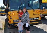 They both help put gas in the big bus and also washed i clean. (dsc )