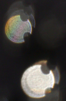 colorful orbs with two indentations