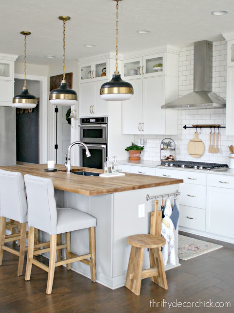 Three pendant lights over island 