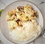 Cream of mushroom chicken and rice is a dish that typically consists of chicken cooked with a creamy mushroom sauce, served over rice.