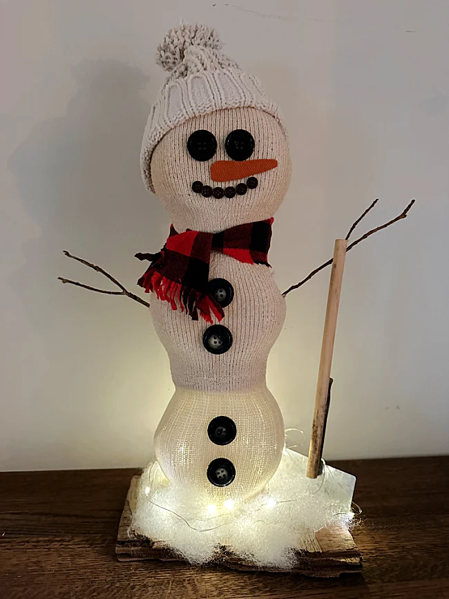 snowman with fairy lights