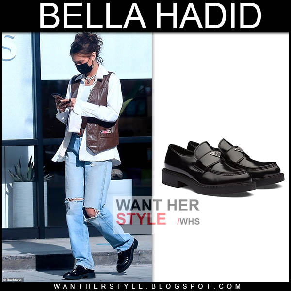 Bella Hadid in ripped jeans and black patent loafers