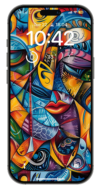 A vibrant abstract mural with a human face, composed of vivid colors and geometric shapes.