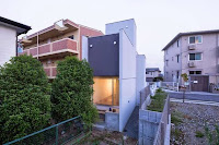 Shiga Narrow Urban Promenade House Design With Concrete Walls And Upper Bridge