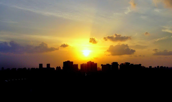 Sunset behind builidings