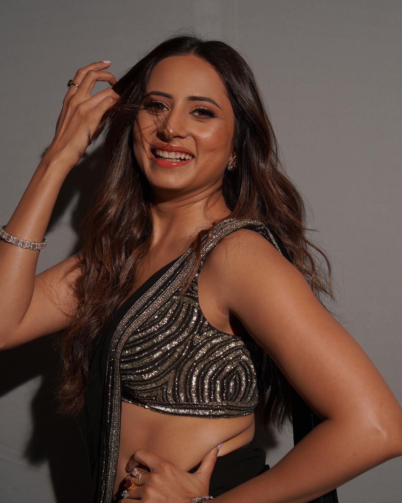 Sargun Mehta raises heat with her sultry avatar in this black high slit  saree - see now.