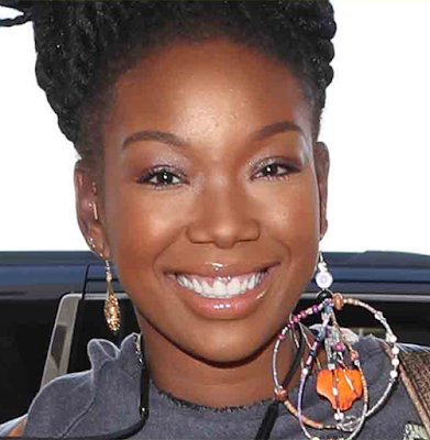 Brandy and her pregnant belly spotted at LAX Airport in Los Angeles