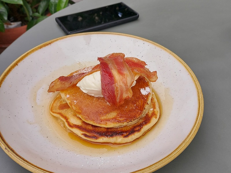 Pancakes with bacon and maple syrup at La Esquina, Barcelona