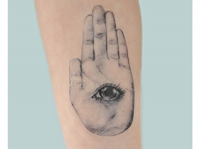 http://www.joellepoulos.com/shop/hamsa-hand-temporary-tattoo-ii/