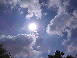 Sun with cloud