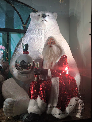 Pic of large polar with Santa sitting on his lap