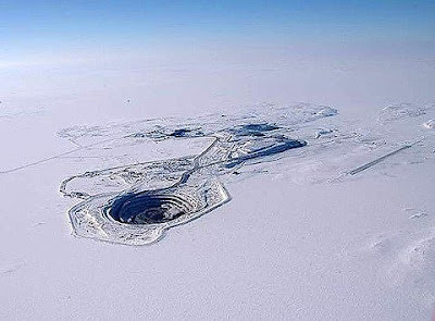 Snow hole: The Diavik Mine encircled by ice