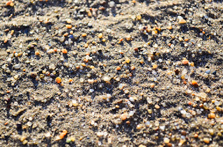 diamonds on beach sand and sea