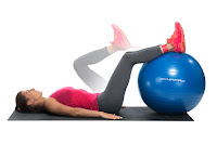 Hip raises and leg pull-Ins with an exercise ball and a mini resistance band