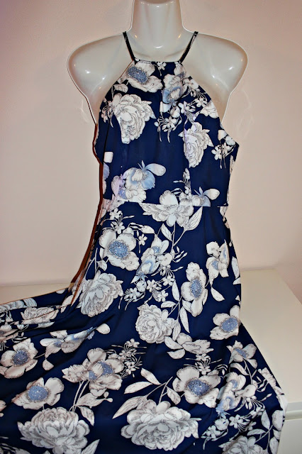 http://www.shein.com/Blue-Halter-Neck-Floral-Print-Maxi-Dress-p-269741-cat-1727.html