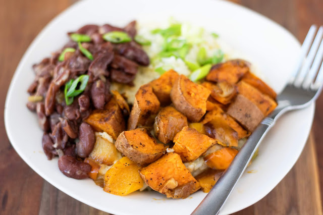 The finished Cajun Sweet Potato Bowl with a fork to the side.  