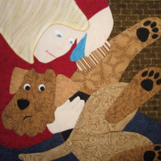 Applique of Airedale being groomed or Airedale Terrier rescue quilt