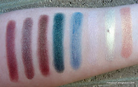 Swatches of Wet N Wild Comfort Zone, Prestige Total Intensity eyeshadow in Bewitched, Makeup Geek Ritzy, Makeup Geek Typhoon, Maybelline Color Tattoo in Seashore Frosts, Blend Mineral Cosmetics PIG3, City Color Mousse in White Gold, and e.l.f. Baked Eyeshadow in Enchanted
