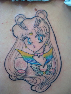  of getting a SMALL white ink tattoo of a sailor moon wand on my hip