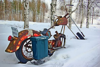 Rusty Mailbox Motocycle in the Snow