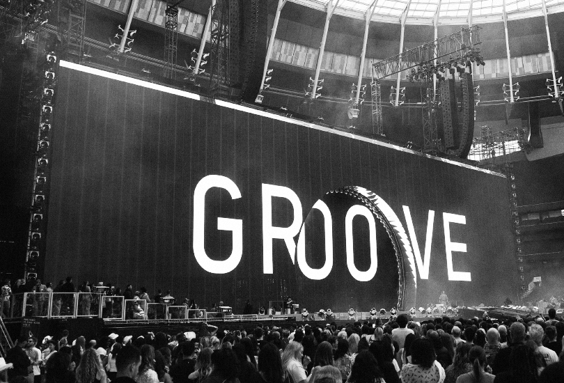 A shot of the giant LED wall at the Renaissance World Tour, displaying the word ‘Groove’.
