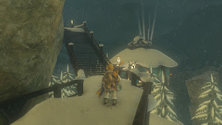 at the snowy Rito Village with the tower in the background