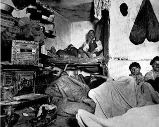 extreme poverty, family living in small dirty room