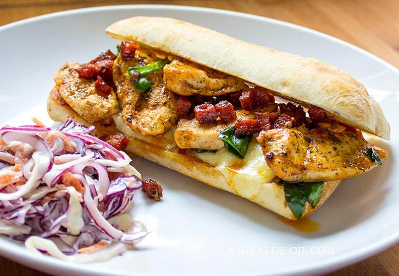 Grilled chicken and cheese sandwich with chorizo.