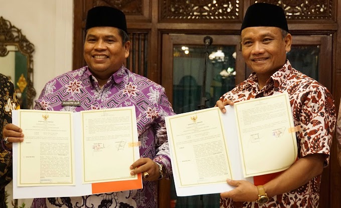 Kerjasama Urusan Pemerintahan, Bupati Suhatri Bur Dengan Walkot Yogyakarta Sumadi Tandatangani MoU