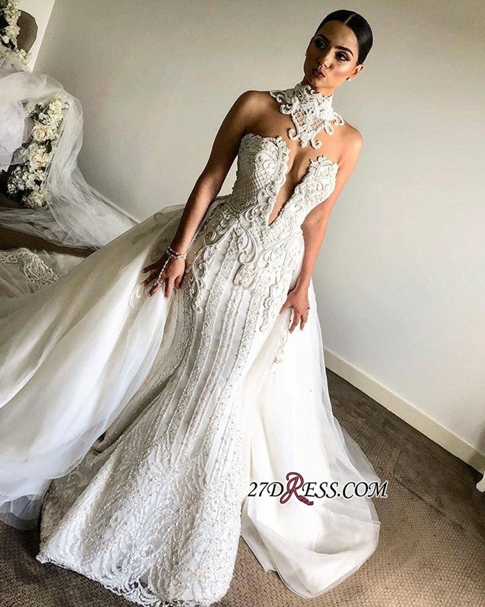 https://www.27dress.com/p/luxurious-high-neck-mermaid-sleeveless-lace-appliques-overskirt-bridal-gown-109232.html