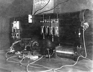 old black and white photograph of radio console