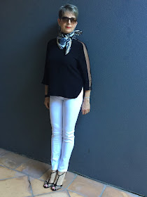 white denims, black blouse, stiletto shoes, vintage scarf