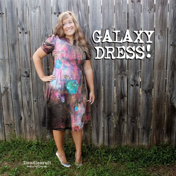 How to Make a Tie Dye Galaxy Dress!  This tie dye galaxy dress is the BEST dress in all of time and space!    This cute dress was on its way out to recycling because of a bleach spot. By upcycling this dress with bleach, tie dye and paint, it turned into a work of art!   Refashion a black dress, shirt, skirt, pants, or any fabric by adding a tie dye galaxy to it!