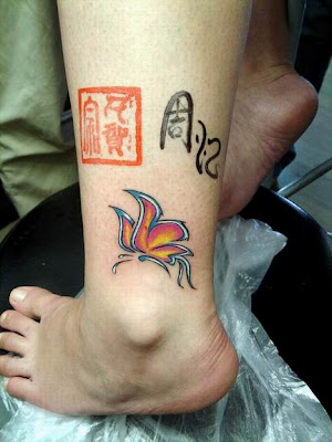 Butterfly tattoo on the ankle.