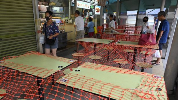 Singapore's famous hawker centres are off limits for all but takeaways now