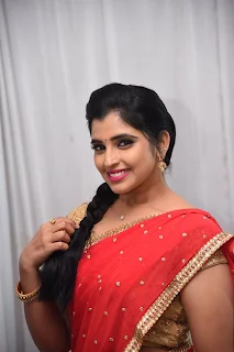 Telugu Anchor Shyamala in Pink and Red Half Saree Stills