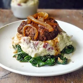 Hamburger Steak with Mushroom Gravy | by Life Tastes Good feeds 4 for about $12 total, and you'll have it on the table in under 30 minutes! #Main #ComfortFood