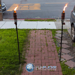 Make a beach theme before the front door, tiki torch 