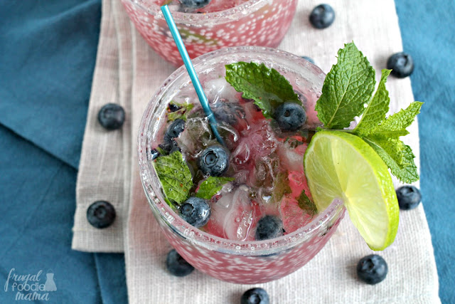 A classic summertime cocktail gets a delicious twist with the addition of fresh blueberries & ginger ale in these refreshing Blueberry Ginger Mojitos.