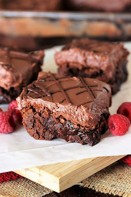 scratch brownies alongside a layer of creamy raspberry truffle topping Raspberry Truffle Brownies